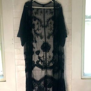 A cute long black throw